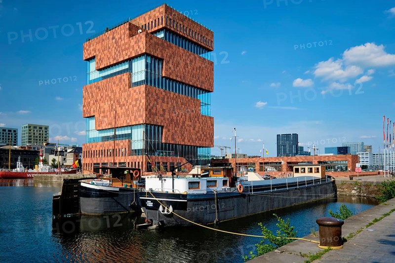 ANTWERP, BELGIUM, MAY 26, 2018: MAS (Museum aan de Stroom) (Museum by the River) on river Scheldt. Opened in 2011, is the largest museum in Antwerp and an example of postmodern Art Deco architecture