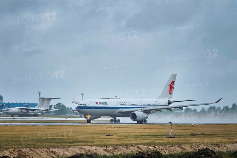 MINSK, BELARUS, JUNE 15, 2018: Air China flight Airbus A330-200 plane taking off on runway in National Airport Minsk