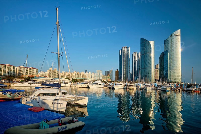 BUSAN, SOUTH KOREA, APRIL 11, 2017: Busan marina with yachts, Marina city skyscrapers with reflection, South Korea, Asia