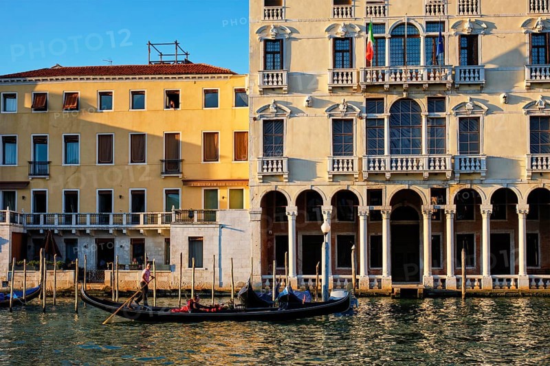 VENICE, ITALY, JUNE 27, 2018: Grand Canal with boats and gondolas on sunset, Venice, Italy, Europe