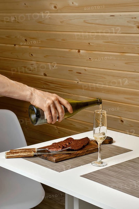 Prosecco or champagne pouring in a glass