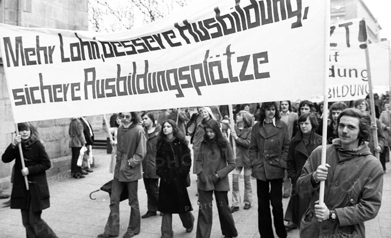 Several hundred apprentices, pupils and students demonstrated together against the reduction of apprenticeships and youth unemployment on 15.03.1975 in Essen, Germany, Europe