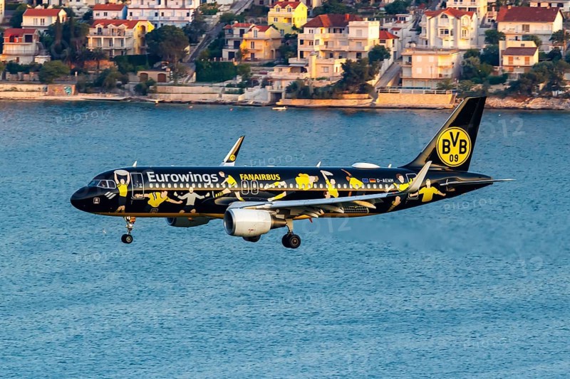 A Eurowings Airbus A320 aircraft with the registration number D-AEWM and the Borussia Dortmund special livery at Split Airport, Croatia, Europe
