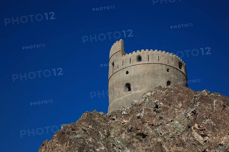 Old watchtower above the old town of Mutrah, Muscat, Oman, Asia