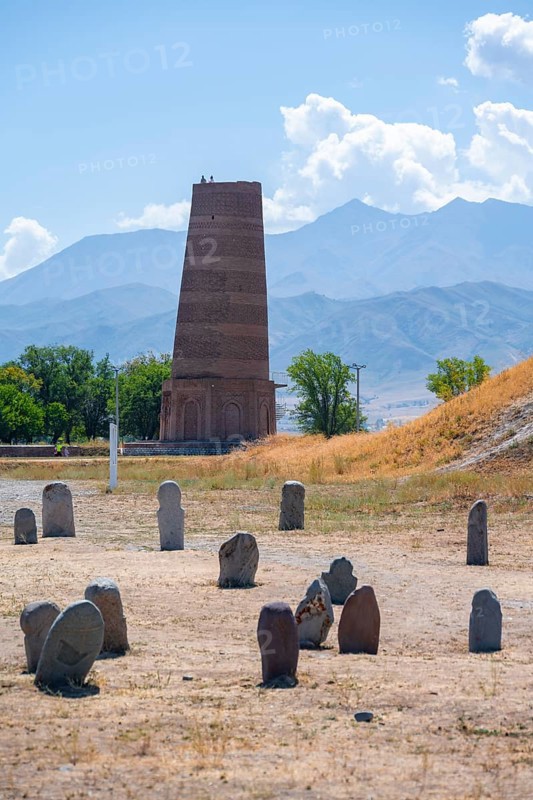 Burana Tower, remains of Karakhanid Minaret, histroic ancient city of Balasagun on the Silk Road, Balbals, historic tombstones in the shape of human faces, near Tokmok, Chuy, Kyrgyzstan, Asia