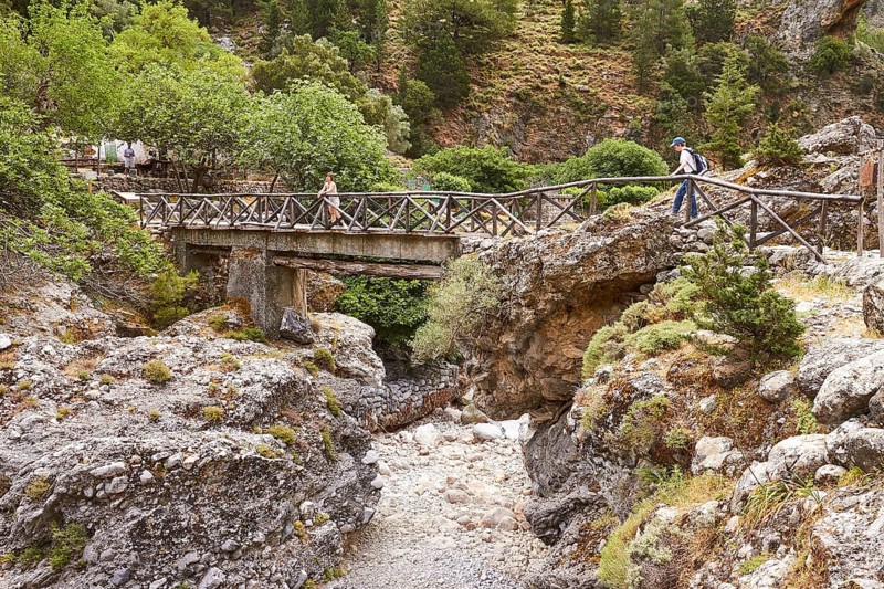 Bridge over stream, hikers on bridge, Samaria settlement, rest area, Samaria gorge, Samaria, gorge, national park, Omalos, Lefka Ori, White Mountains, West Crete, island of Crete, Greece, Europe