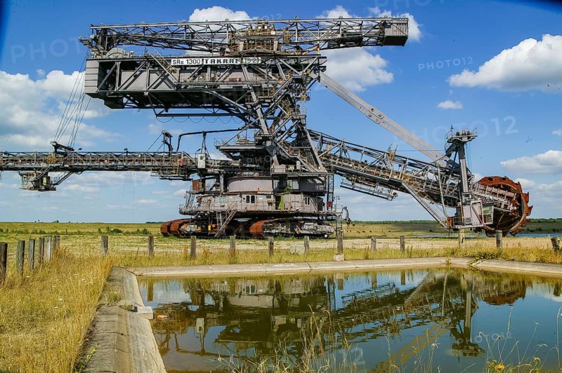 Ferropolis is an industrial museum and event venue in Gräfenhainichen, east of Dessau-Roßlau, on a peninsula in Lake Gremmin, the former Golpa-Nord open-cast mine. Ferropolis is an anchor point of the European Route of Industrial Culture