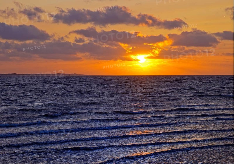 Outgoing tidal fringe in the mudflat landscape with setting sun, North Sea, Norderney Island, East Frisia, Lower Saxony, Germany, Europe