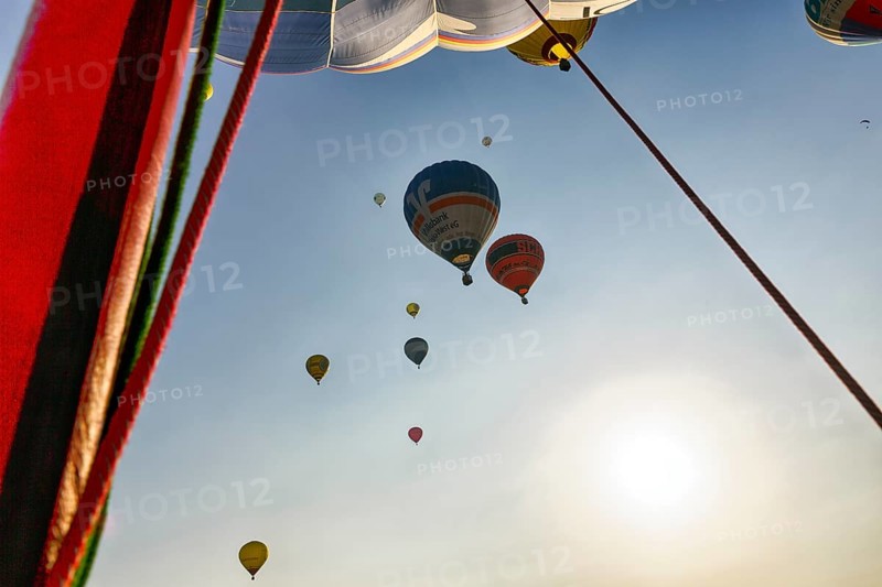 Countless hot air balloons take to the skies, view from below, mass launch, Hot Air Balloon Festival, 26th Warsteiner International Montgolfiade, Warstein, Sauerland, North Rhine-Westphalia, Germany, Europe
