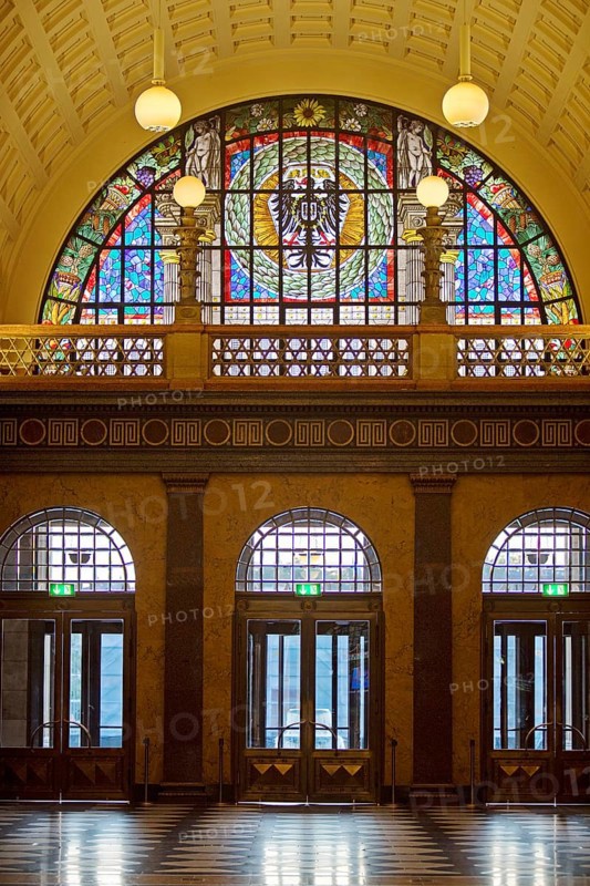 Entrance area with glass window, illuminated foyer in the spa hotel and casino in the evening, Wiesbaden, Hesse, Germany, Europe