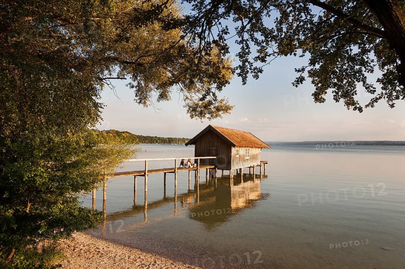 Boathouse with jetty, summer light, Herrsching am Lake Ammer, Bavaria, Germany, Europe
