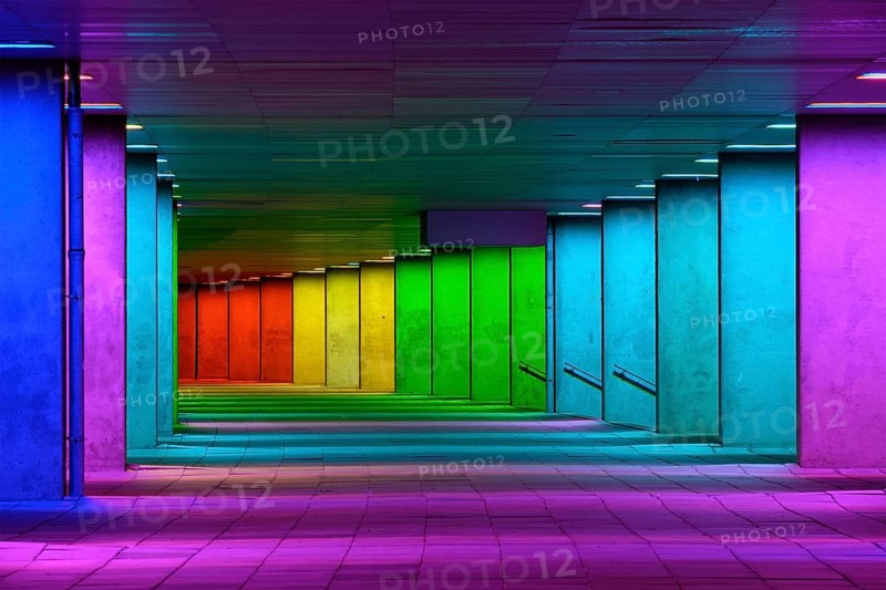 Colorful mulitcolord illuminated gallery tunnel rainbow passage under NAI building, Nederlands Architecture Institute near Museum Park, Rotterdam, The Netherlands, Europe