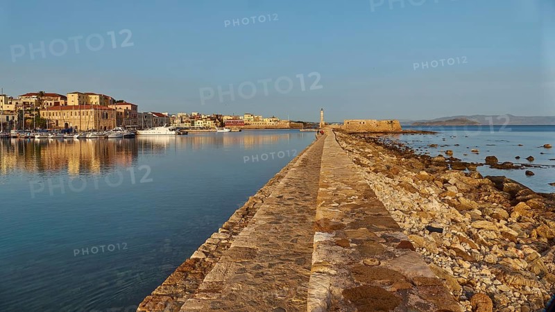 Venetian old town, Venetian harbour, Venetian lighthouse, harbour wall, boats, sailboats, fishing boats, blue cloudless sky, Chania, West Crete, island of Crete, Greece, Europe