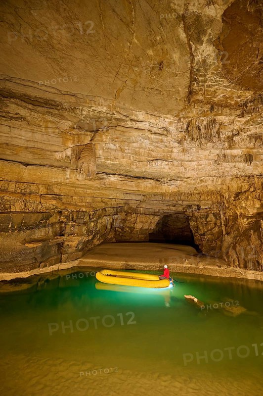 Karst cave, lake, rubber dinghy, speleologist, Krizna jama, Cerknica, Carniola, Slovenia, Europe