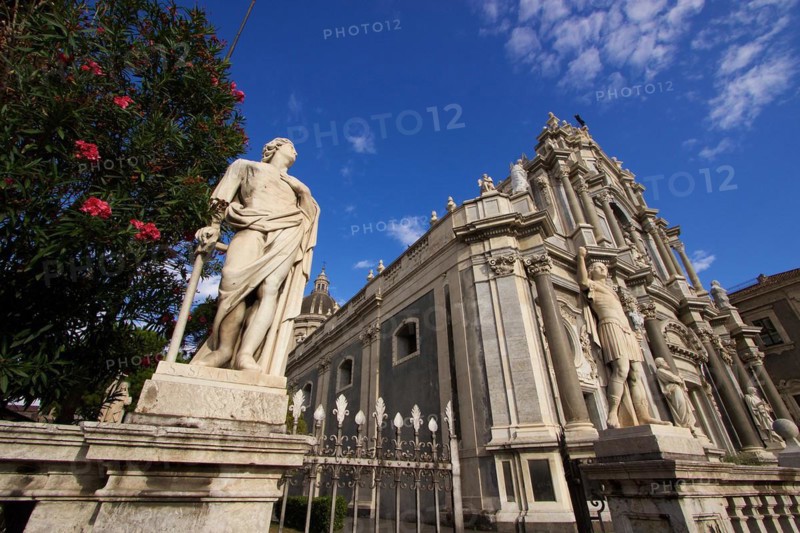 Super wide angle, oblique from below, sculpture, cathedral, blue sky, white clouds, Catania, Old Town, Baroque Old Town, Eastern Cuisine, Sicily, Italy, Europe