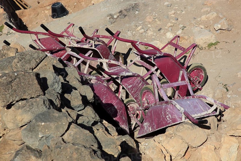 Construction workers' wheelbarrows, renovation of Samhuram, Khor Rouri, excavation site on the ancient Incense Road, Unesco World Heritage Site, near Salalah, Oman, Asia
