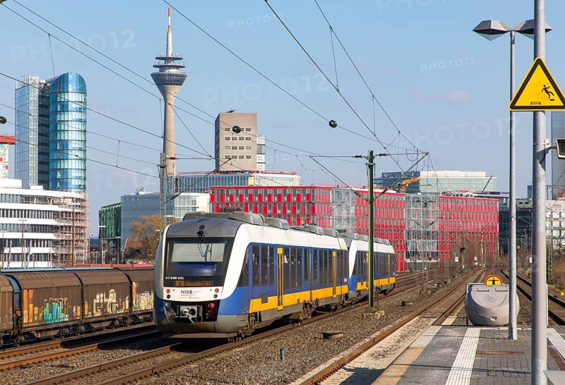 S-Bahn station, Düsseldorf-Hamm stop, Düsseldorf city centre skyline, Medienhafen, local train, NWB train, Nordwestbahn