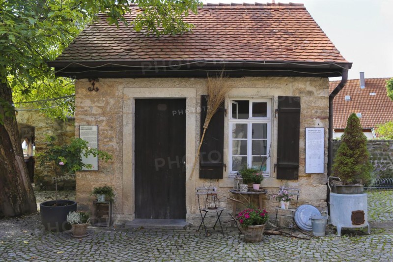 Gomaringen Castle, former bakehouse and washhouse, prison in the castle courtyard, Gustav Schwab Museum, historical building, architecture, small house, windows, shutters, wooden door, washing utensils, broom, Gomaringen, Baden-Württemberg, Germany, Europe