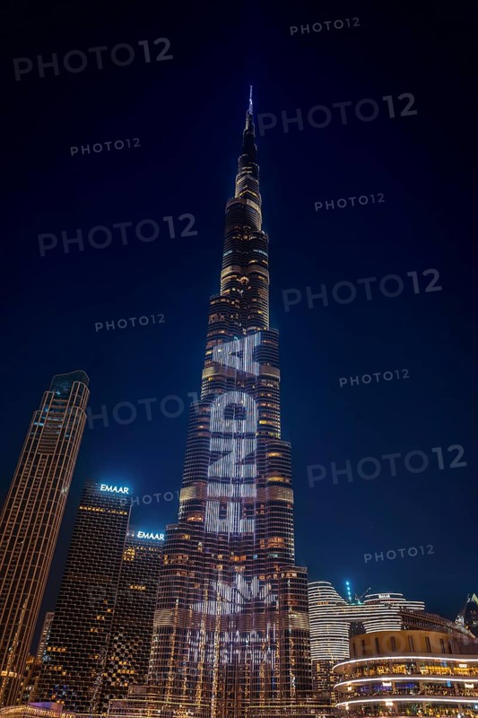 Night shot, illuminated advertising at the Burj Khalifa, Downtown, Dubai, United Arab Emirates, Asia