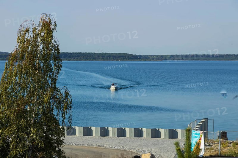 Geierswalder See, Upper Sorbian Lejnjanski jezor, is an artificial lake. It lies mostly in the Free State of Saxony northwest of Hoyerswerda and partly in Brandenburg. The villages of Geierswalde and Kleinkoschen, a district of Senftenberg, lie directly on the lake