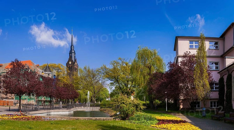 Coswig, Wettinplatz and Peter Paul Church The foundation stone for the new Coswig church was laid on 11 November 1901. Built according to the designs of the Dresden architect Woldemar Kandler, the Protestant church was consecrated to the patron saints Peter and Paul on 11 November 1903