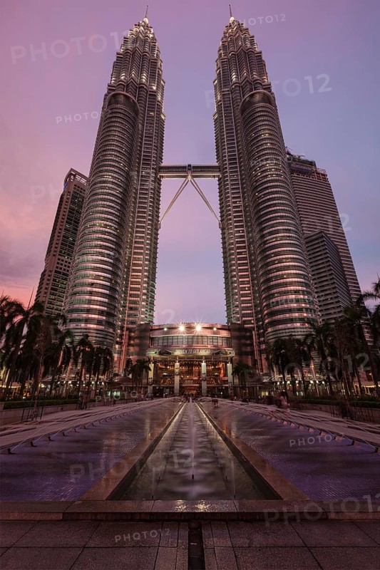 KUALA LUMPUR, MALAYSIA, MAY 5: Petronas Twin Towers in twilight on May 5, 2011 in Kuala Lumpur. They were the tallest building in the world 1998-2004 and remain the tallest twin building