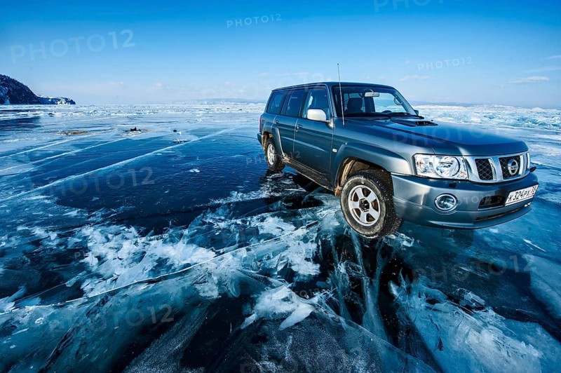 Car on ice, Lake Baikal, Olkhon Island, Pribaikalsky National Park, Irkutsk Province, Siberia, Russia, Europe