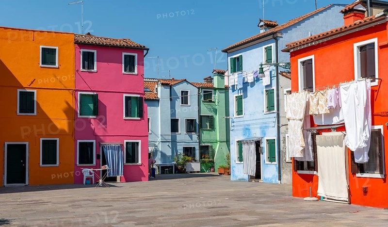 Colourful houses with washing lines, colourful house facades, alleyways on the island of Burano, Venice, Veneto, Italy, Europe