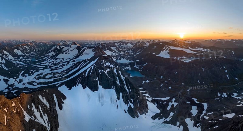 Aerial view of the peaks of Swedish Lapland, view into the valley Unna Räitavagge, also Unna Reaiddavaggi, at midnight sun, mountain Pyramiden and Knivkammen, Kebnekaise massif, Lapland, Sweden, Europe