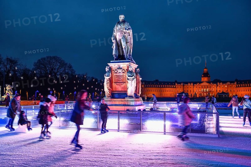 Ice skating rink on Schlossplatz, Karlsruhe Castle in the background, Karlsruhe, Baden-Württemberg, Germany, Europe