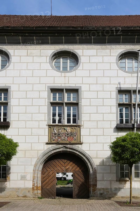 Alliance coat of arms of Count Rudolf VI von Helfenstein and Anna Maria von Staufen on Helfenstein Castle, elephant, heraldic animal, Wiesensteig Castle, residential castle of the Helfensteins, historic building, Renaissance style, architecture, former residence, town house, former seat of the Counts of Helfenstein-Wiesensteig, façade, round window, ox-eye window, passageway, wooden gate, Wiesensteig, Filstal, Baden-Württemberg, Germany, Europe