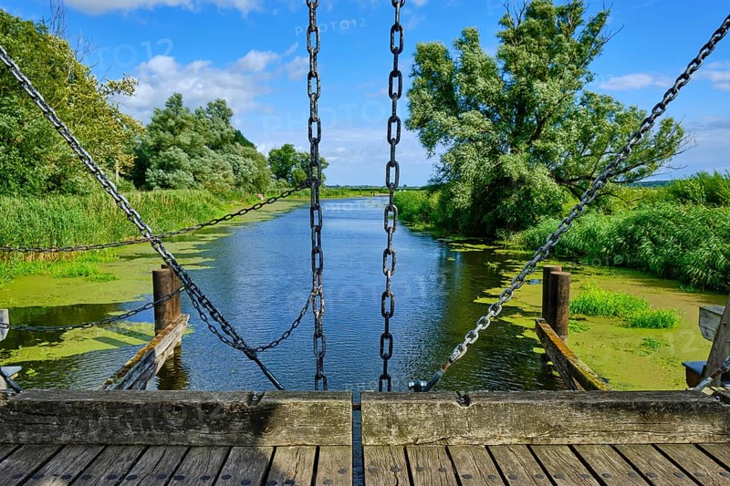 Picturesque river landscape, view from the heritage-protected wooden bascule bridge over the Trebel near Nehringen, municipality of Grammendorf, Mecklenburg-Western Pomerania, Germany, Europe