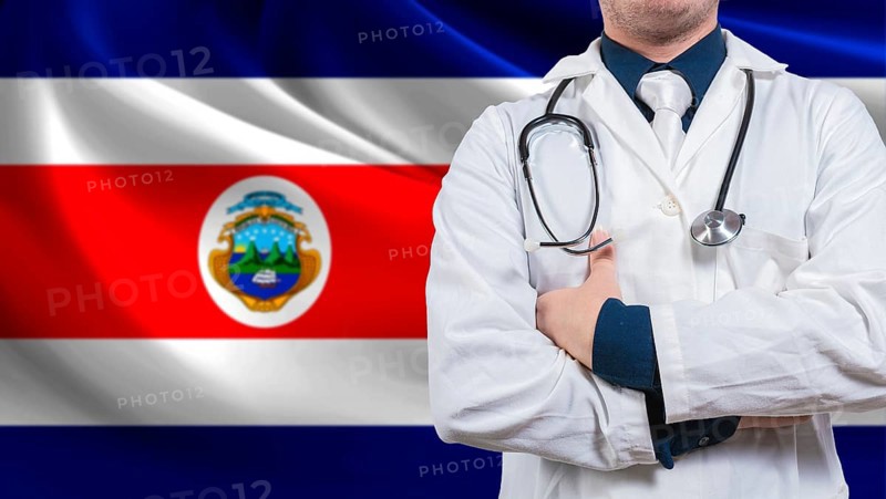 Doctor with stethoscope on Costa Rica flag. Costa Rica national health concept, Health and care with flag of Costa Rica