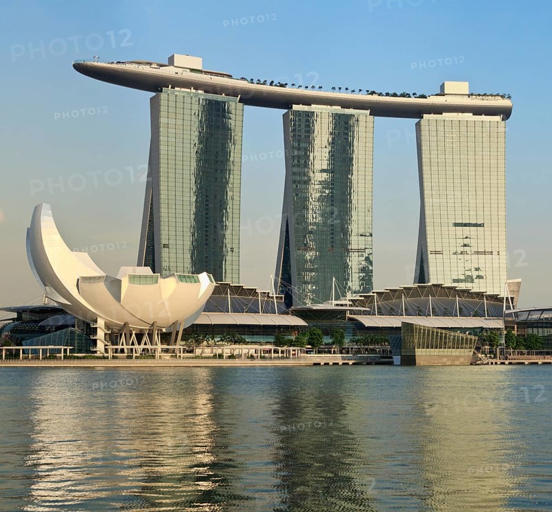 SINGAPORE, MAY 6: The Marina Bay Sands complex on sunset on May 6, 2011 in Singapore. Marina Bay Sands is an integrated resort and billed as the world's most expensive standalone casino property