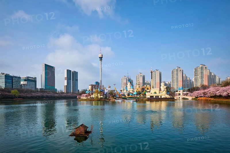 SEOUL, SOUTH KOREA, APRIL 7, 2017: Lotte World amusement park Magic Island in Seokchon lake. Seoul, South Korea, Asia
