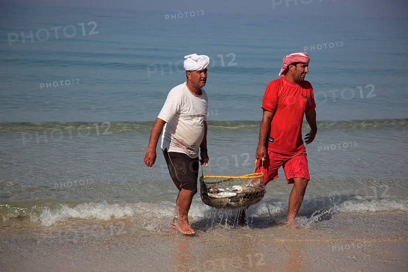 Fishermen on the Arabian Gulf, near Tibat, in the Omani enclave of Musandam, Oman, Asia
