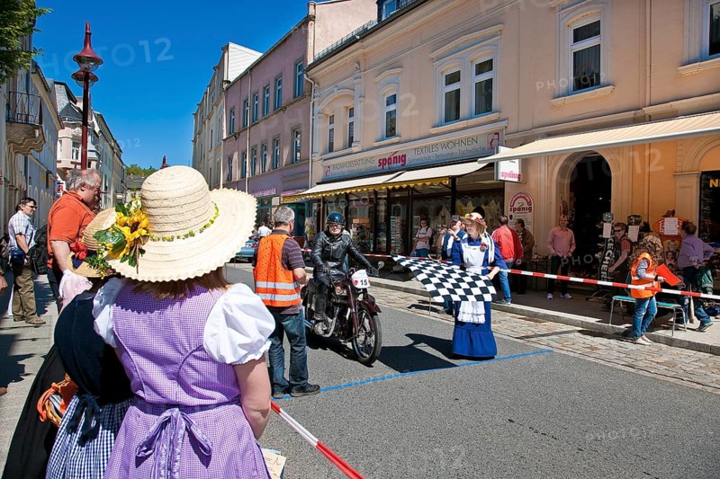 Sebnitz, town festival with classic car rally. The new flower girl Tina Häntzschel starts the motorbikes for the races