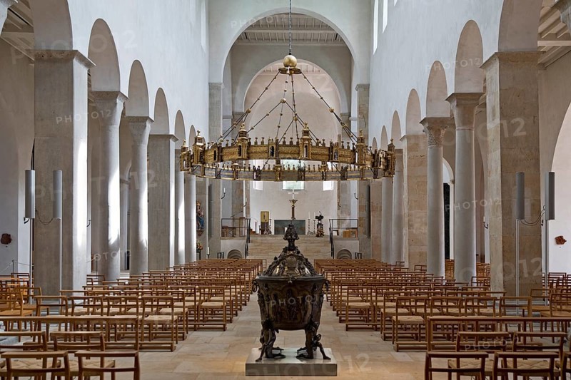 St. Mary's Cathedral, interior view with bronze baptismal font and hezilo chandelier, UNESCO World Heritage Site, Hildesheim, Lower Saxony, Germany, Europe