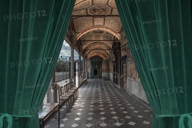 View through the door curtain into the upper arcade of the Villa del Principe, Palazzo di Andrea Doria, Piazza dei Principe, Genoa. Italy