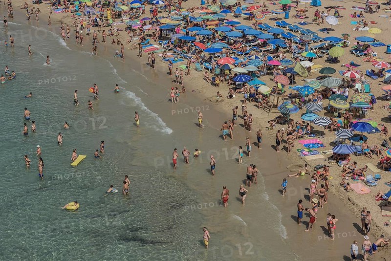 Tourists at the Playa Mal Pas, Benidorm, Province of Alicante, Costa Blanca, Spain, Europe