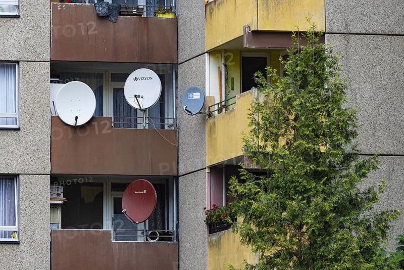 High-rise residential building with balconies and satellite dishes, Trabantenstadt Chorweiler in Cologne, North Rhine-Westphalia, Germany, Europe