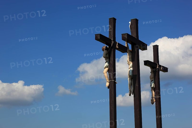 The three crosses on the Kreuzberg near the city of Bischofsheim an der Rhön, Rhön-Grabfeld district, Lower Franconia, Bavaria, Germany. The three crosses on the Kreuzberg near the city of Bischofsheim, Rhön Mountains, Lower Frankonia, Bavaria, Germany, Europe