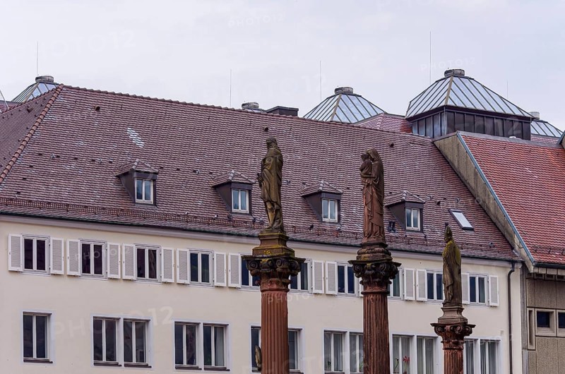 Plague pillars with patron saints in front of the main portal of Freiburg Cathedral on Münsterplatz in the historic old town of Freiburg im Breisgau, Baden-Württemberg, Germany, Europe