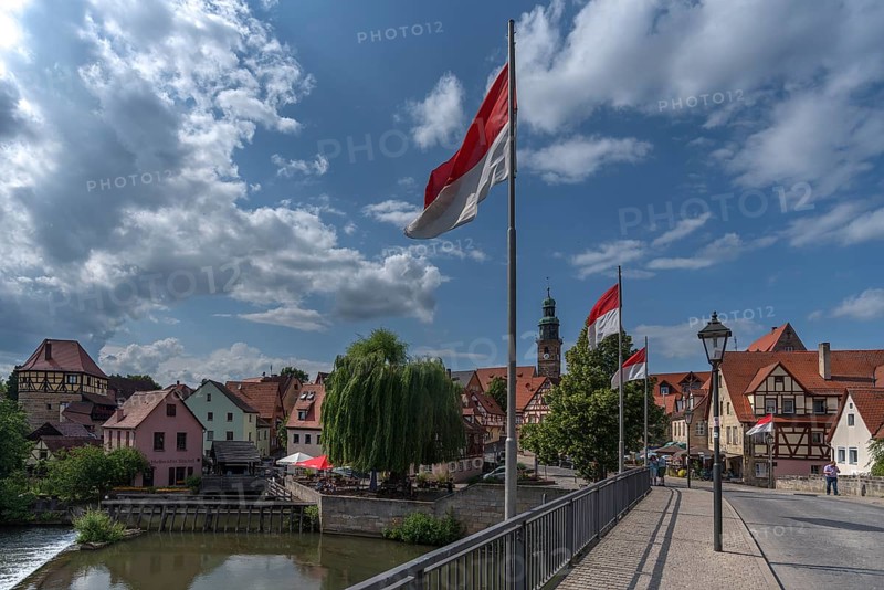 View of the old town, bridge with waving flags in front, Lauf an der Pegnitz, Middle Franconia, Bavaria, Germany, Europe