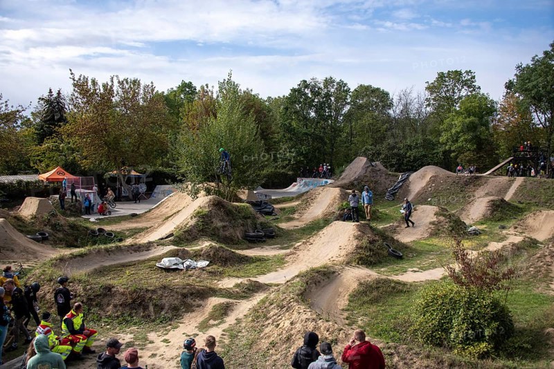 Young people jumping over mounds with BMX bikes, sport dirt jump, Magdeburg, Saxony-Anhalt, Germany, Europe