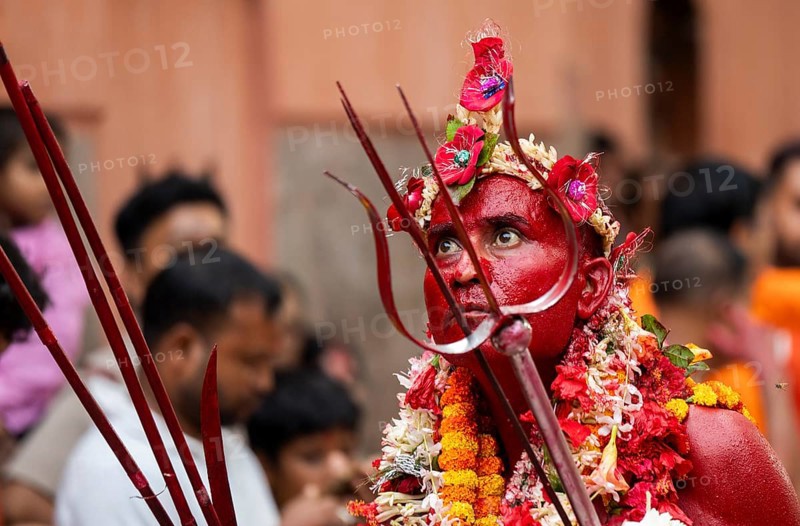 GUWAHATI, INDIA, AUGUST 19: Priest dance in the beat of Dhol (Drum) during the annual three-day-long Deodhani festival at the Kamakhya Temple on August 19, 2024 in Guwahati, India. The Deodhani festival is dedicated to Serpent Goddess Kamakhya, people believed that Goddess Kamakhya fulfills the wishes of the devotees who participate in this festival