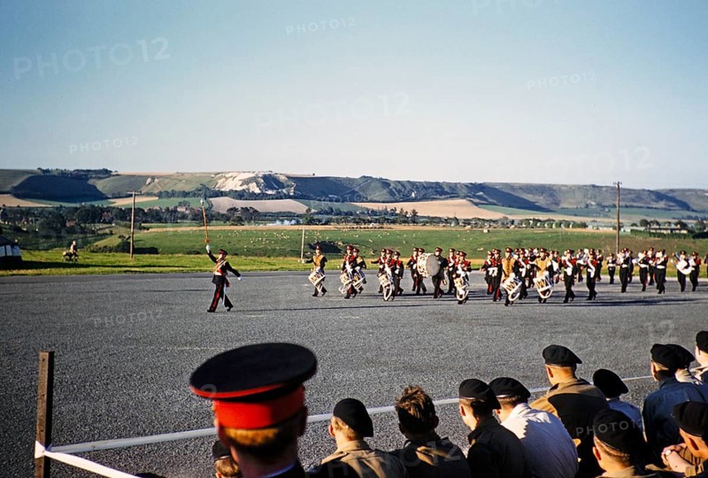 Pupils taking part in military exercises as army cadets, South of England, United Kingdom, late 1950s, marching band, Europe