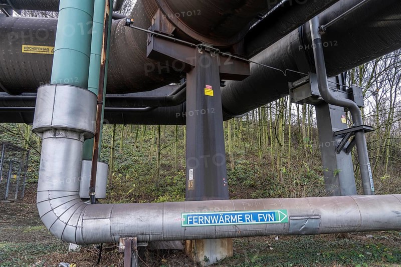 Pipelines for district heating, at the Thyssenkrupp Steel site in Duisburg Marxloh, waste heat from steel production is fed into the district heating network of the Niederrhein-Duisburg district heating association, the FVN supplies over 40, 000 households in the Lower Rhine region with district heating, North Rhine-Westphalia, Germany, Europe
