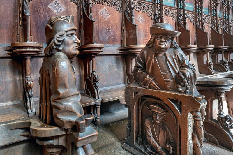 Figures on the late Gothic choir stalls from 1507, St Martin, Memmingen, Bavaria, Germany, Europe