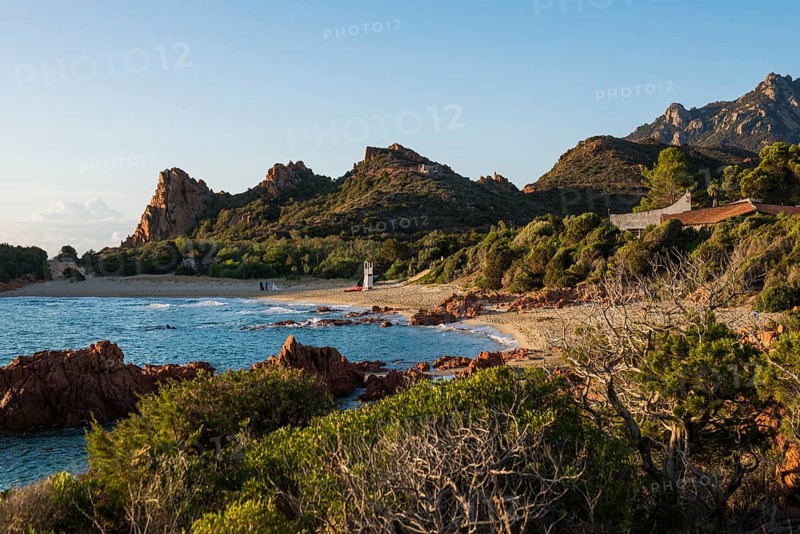 Lonely picturesque beach and red rocks, Spiaggia Su Sirboni, sunrise, near Tertenia, Province of Ogliastra, Sardinia, Italy, Europe